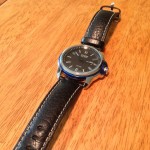With a leather strap.